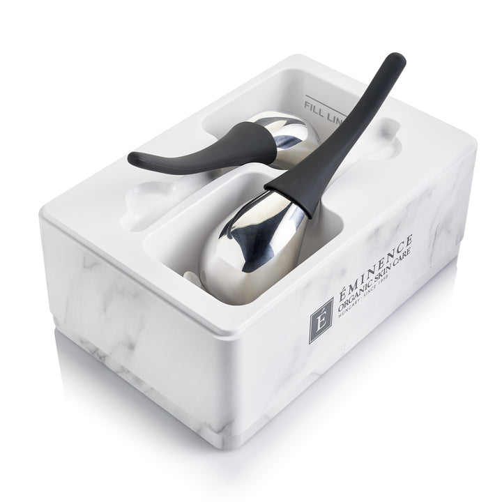 Eminence Organics Cryo-Thermal Sculpting Tool utilizing the tools inside the storage box