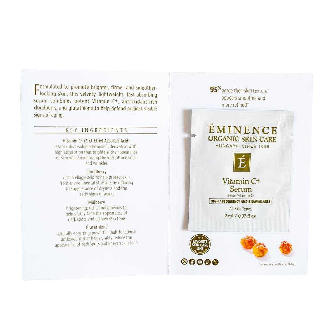 An open white Eminence Organics Vitamin C+ Serum sample, showing the front and back printed panels on a white background.